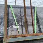 Sintered stone slab, Black & White Root pattern, matte finish.