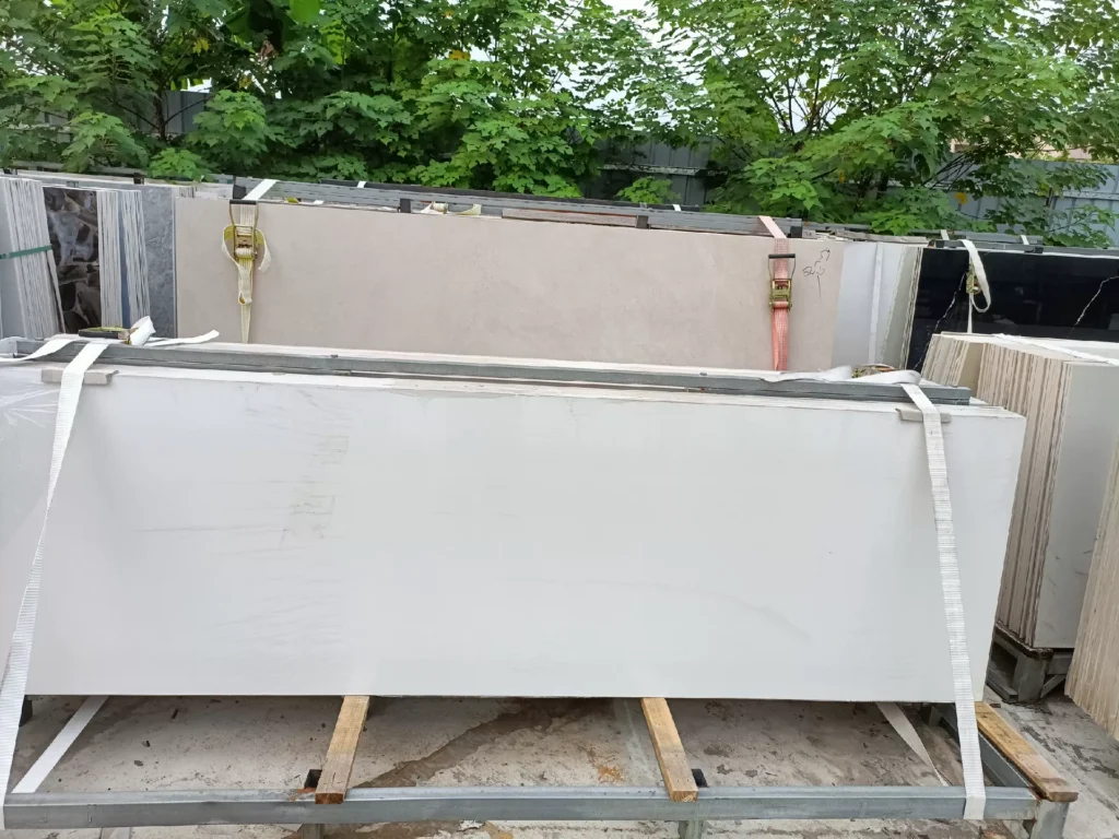 Glossy white sintered stone slab close-up