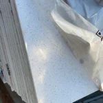 White medium-grain quartz stone slab