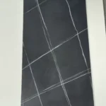 Sintered stone slab black gold pattern close-up