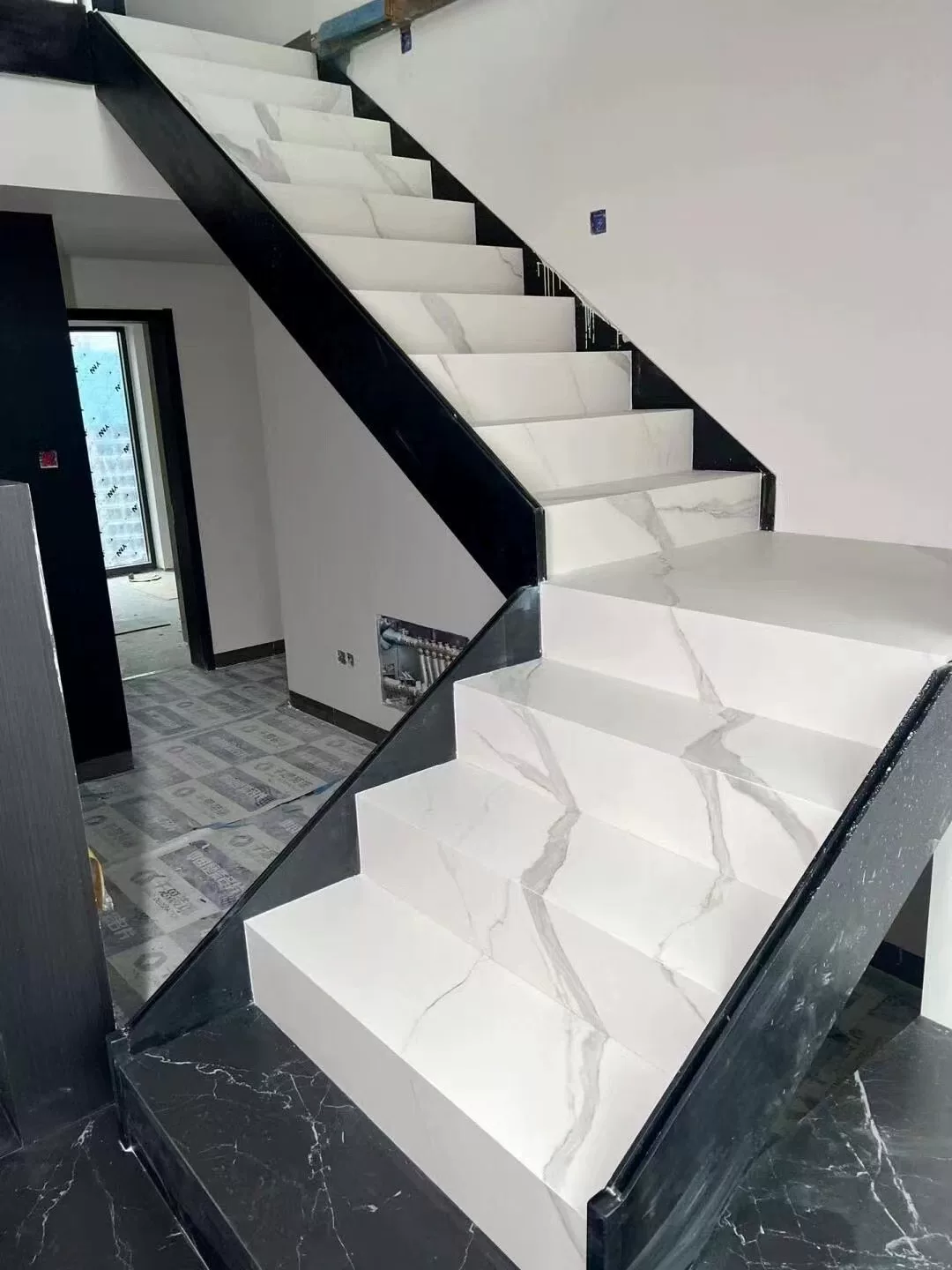 Marble-look porcelain stair tread panel stock