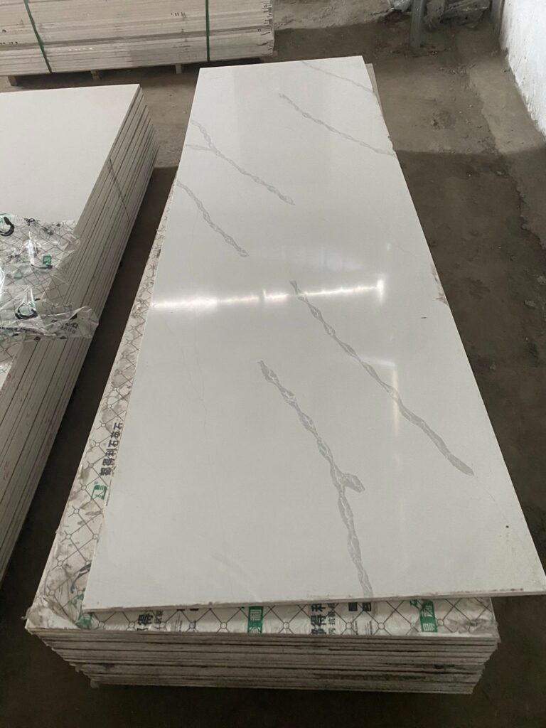 Quartz stone slab with Fish Belly White pattern - stock lot view