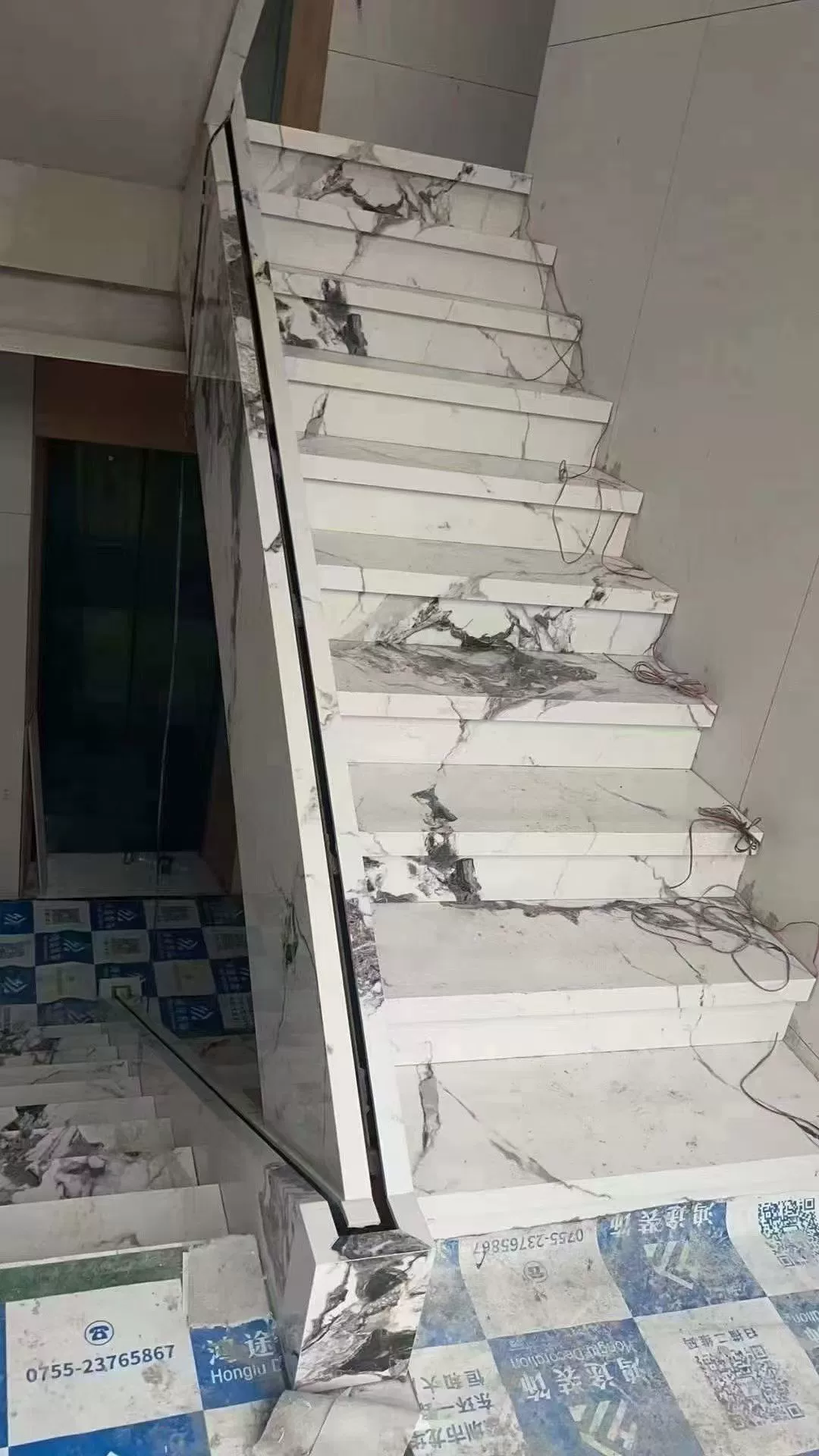 Marble-look porcelain stair tread panel stock