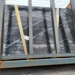 Sintered stone slab, Black & White Root pattern, matte finish.